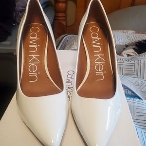 Platinum white Calvin Klein heels. 8.5